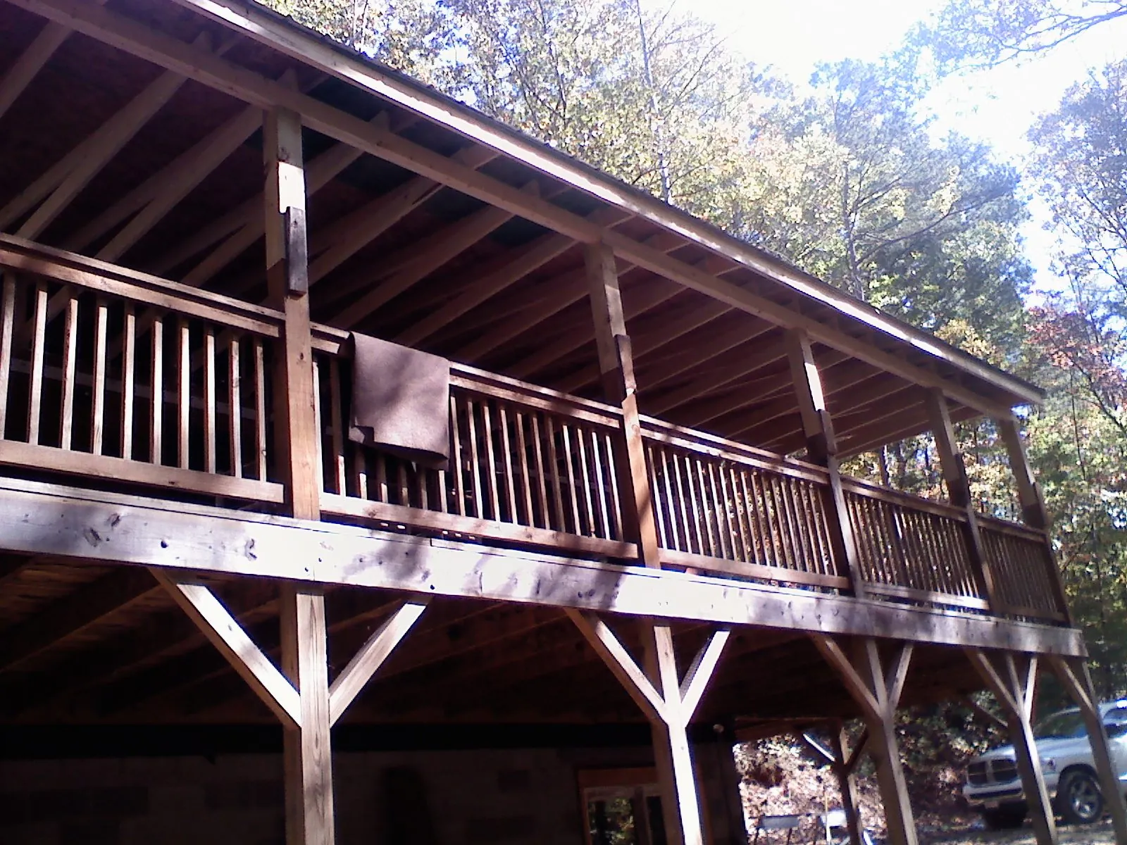 Timber framing under a new elevated porch and deck — Roof Leak Repair in Lyon Station by Roofing Brothers